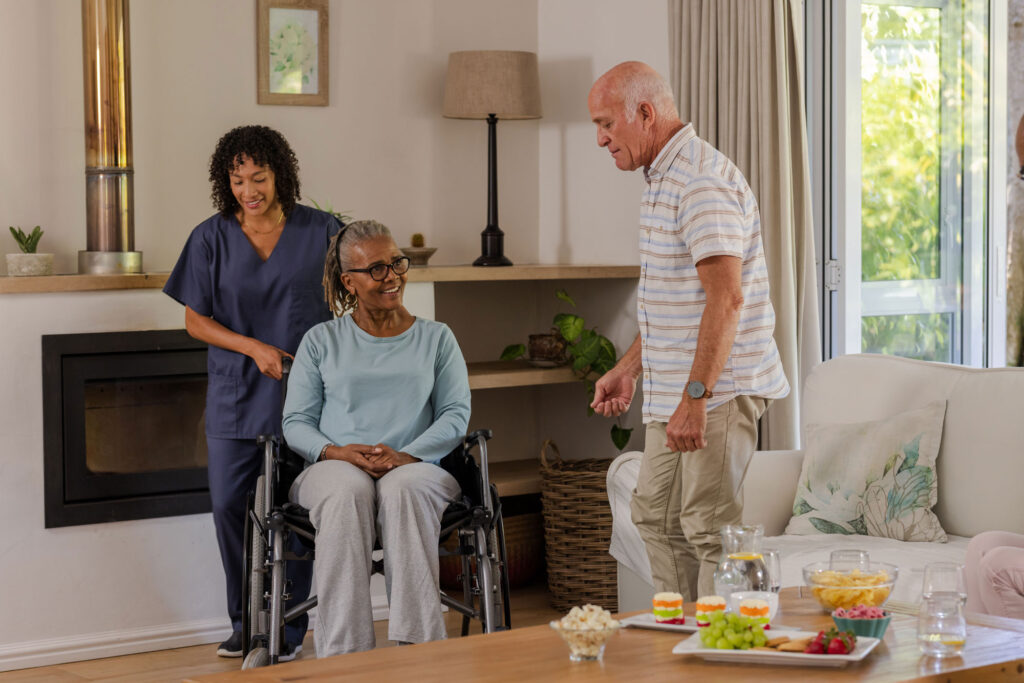 About Us page showing caregiver assisting elderly clients in a home care environment
